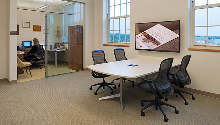 Administrative meeting space with shared Dividends Horizon® Media Enclave and ReGeneration by Knoll® Chairs